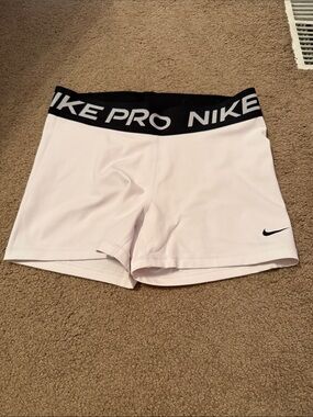 Nike Pro Women's Pale Pink Training Shorts with Black Logo Waistband